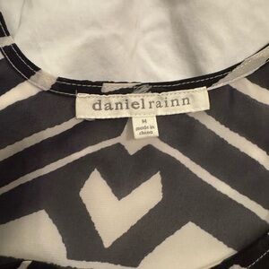 Sheer flowy black and white tank top